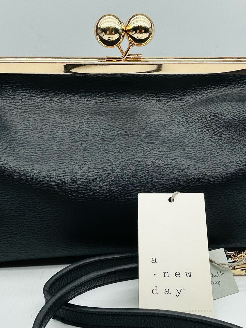 A New Day Black Faux Leather Frame Clutch with Gold Hardware, detachable strap